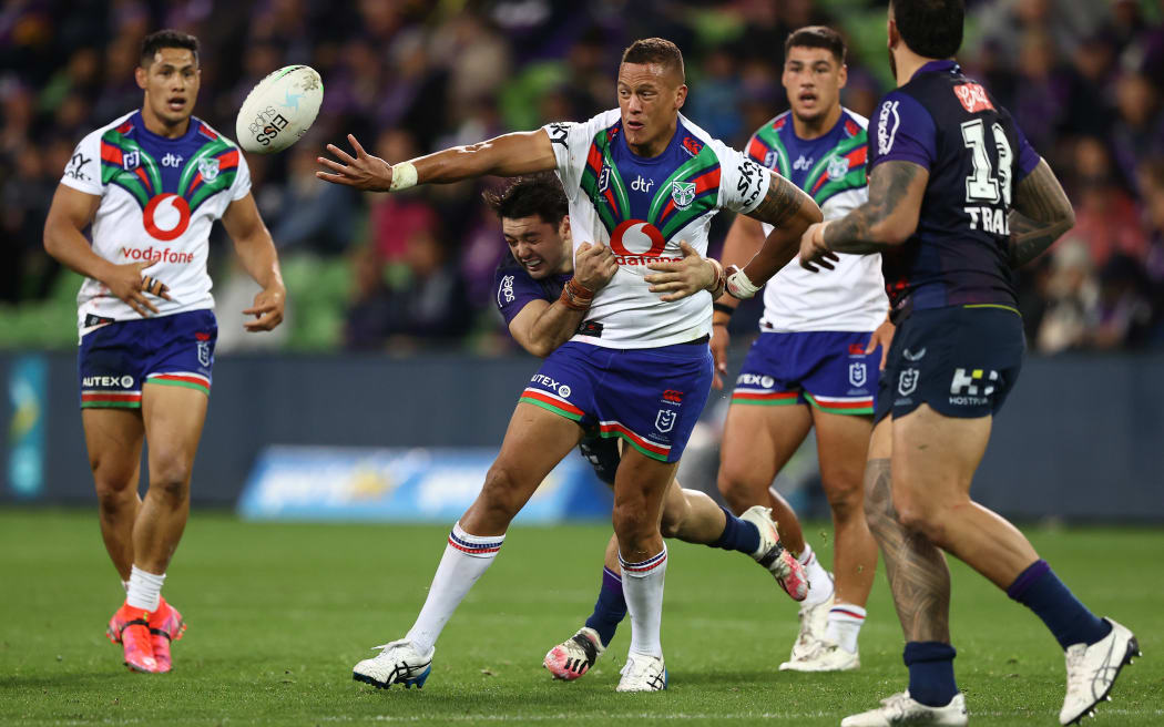 MELBOURNE, AUSTRALIA - APRIL 25:  Kane Evans of the Warriors is tackled during the round seven NRL match between the Melbourne Storm and the New Zealand Warriors at AAMI Park on April 25, 2021, in Melbourne, Australia. (Photo by Robert Cianflone/Getty Images)