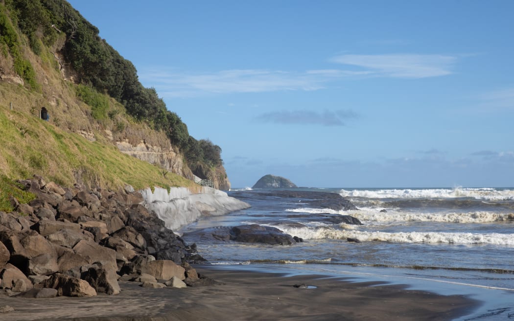 Muriwai Beach the day after a Burmese couple drowned while fishing off the rocks.