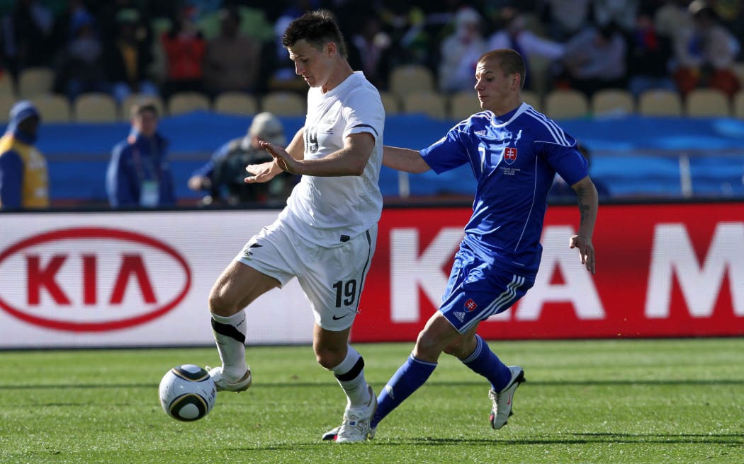 Tommy Smith of New Zealand and Vladimir Weiss of Slovakia during the the FIFA World Cup 2010 match
