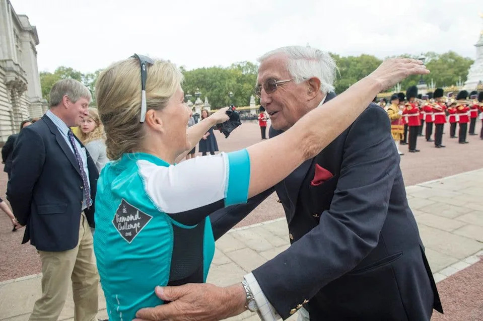The Duchess of Edinburgh going to hug Christopher Rhys-Jones