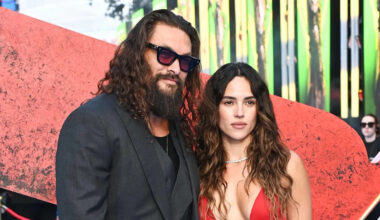 Jason Momoa is loved up with girlfriend Adria Arjona at Supergirl event