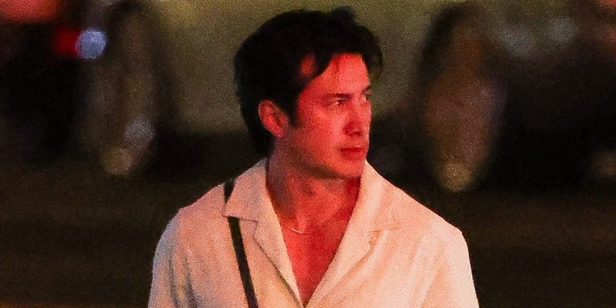 Hudson Williams Is Ready for Summer in a Plunging Linen Top and Dad Sneakers