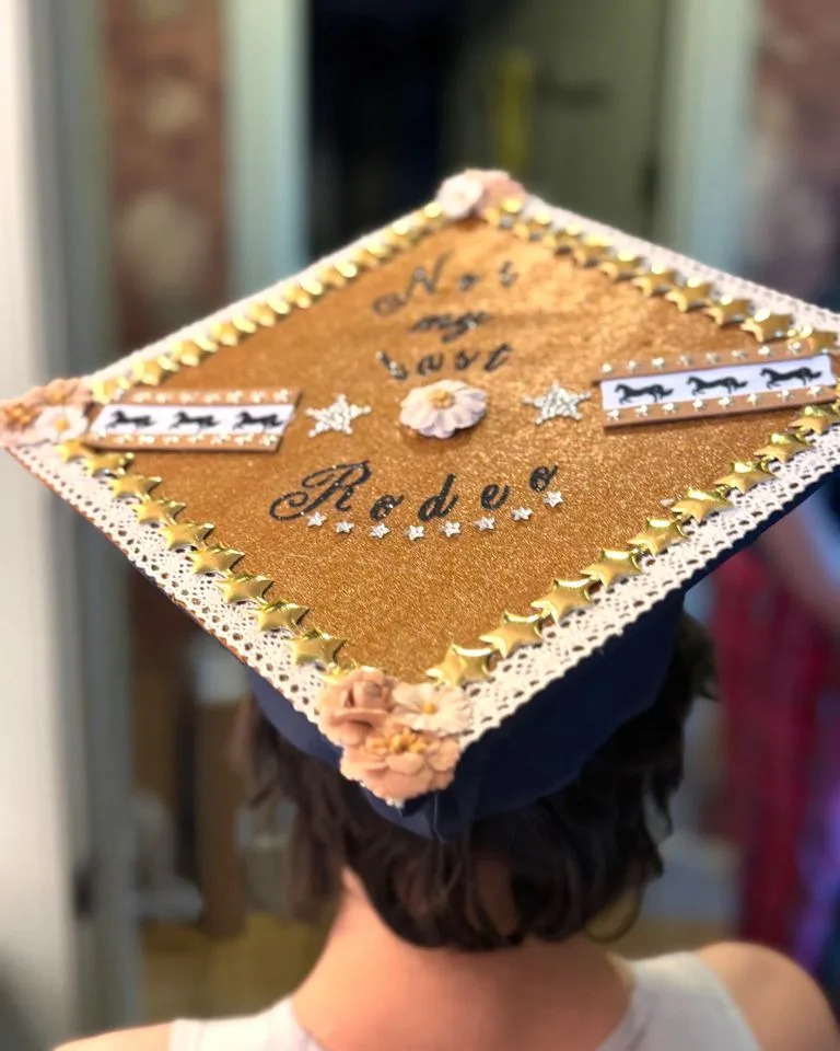 A close-up of Emme Muniz's graduation cap.Credit: Jennifer Lopez/Instagram