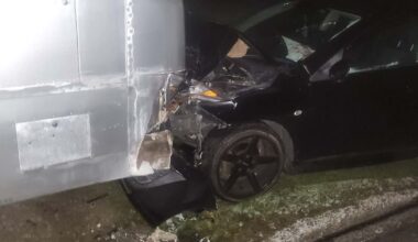 Driver seriously injured after car slams into parked bus on Ford Rd