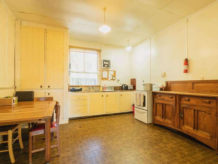 The tired five-bedroom villa at 11 Rue Balguerie, in Akaroa, is believed to date back to the 1860s. Photo / Supplied