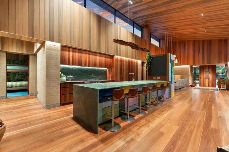 The three-bedroom rammed-earth home at 97 Sharp Road, in Matakana, is known locally as Obsidian House. Photo / Supplied