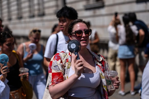 Fans, cold drinks and light clothing were all popular choices in the sunshine.