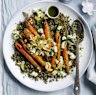 Whole roast carrots with lentils, goats curd and garlic chips.