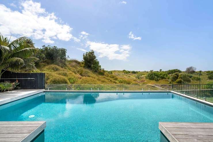 A landmark beach home is up for grabs at 17A Oceanbeach Road, in Mount Maunganui. Photo / Supplied