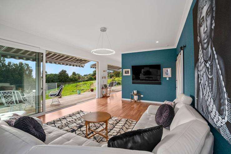 A two-bedroom cottage at 614 Kaitemeko Road, in Welcome Bay, comes with its own special piece of protected bush. Photo / Supplied