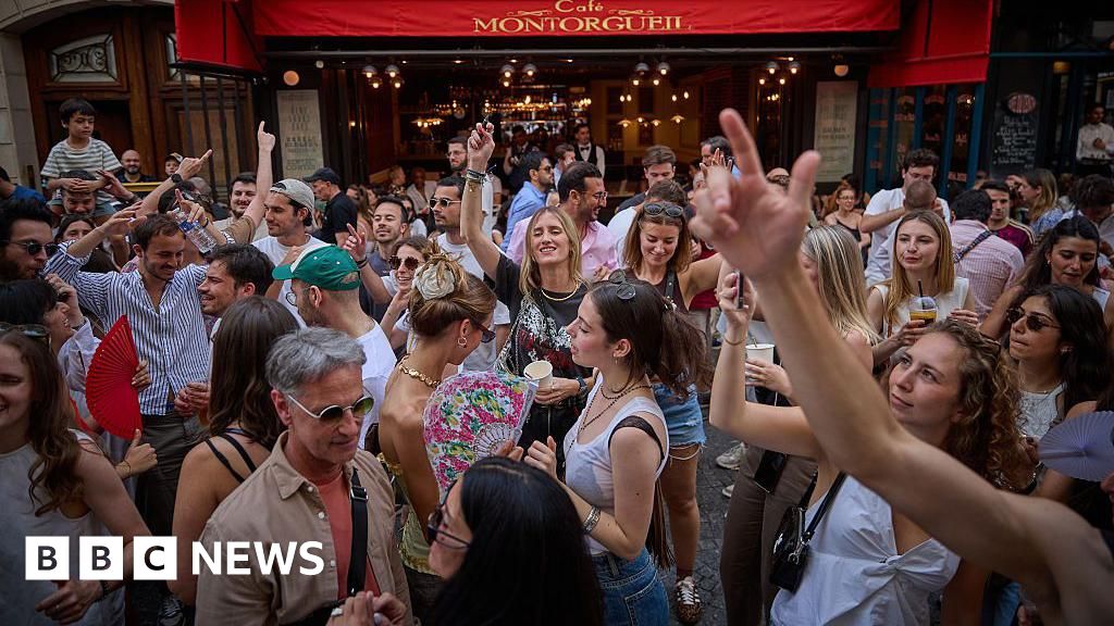 France bans alcohol at music festival events under red headwave alert - BBC