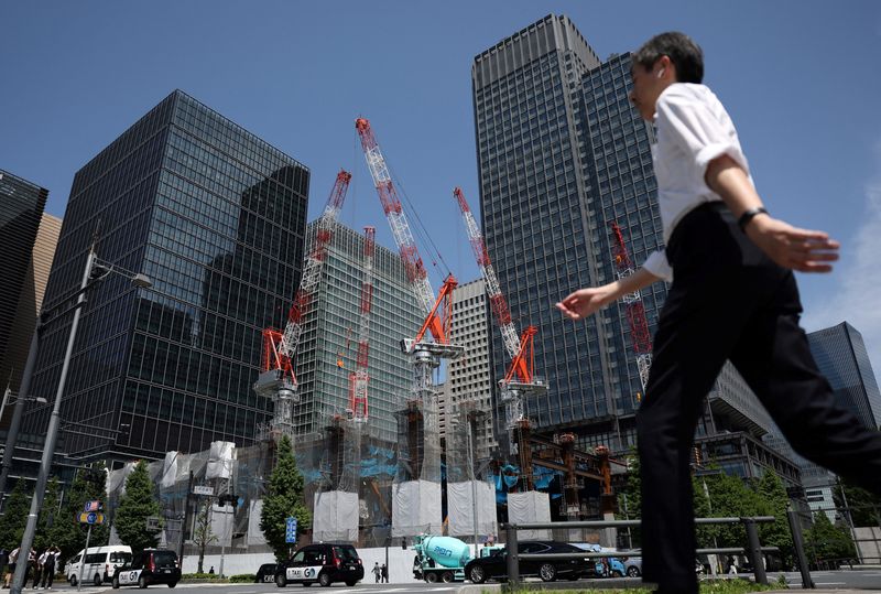Japan's economy cools on weak capex in Q1, revised data shows