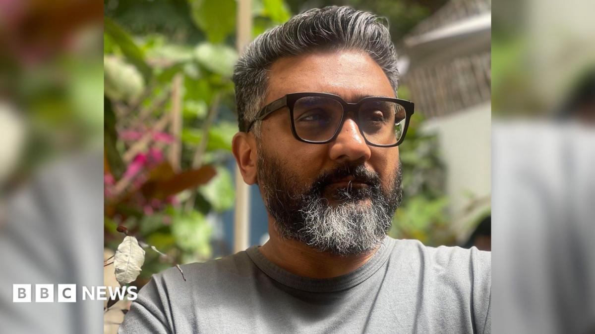 Kunal Shah, founder of Indian fintech start-up Cred, wearing a grey tee shirt and sporting sunglasses.