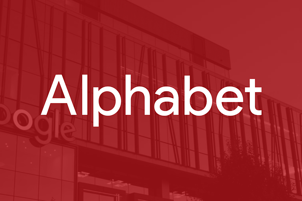The Alphabet logo superimposed over an image of Google headquarters building.