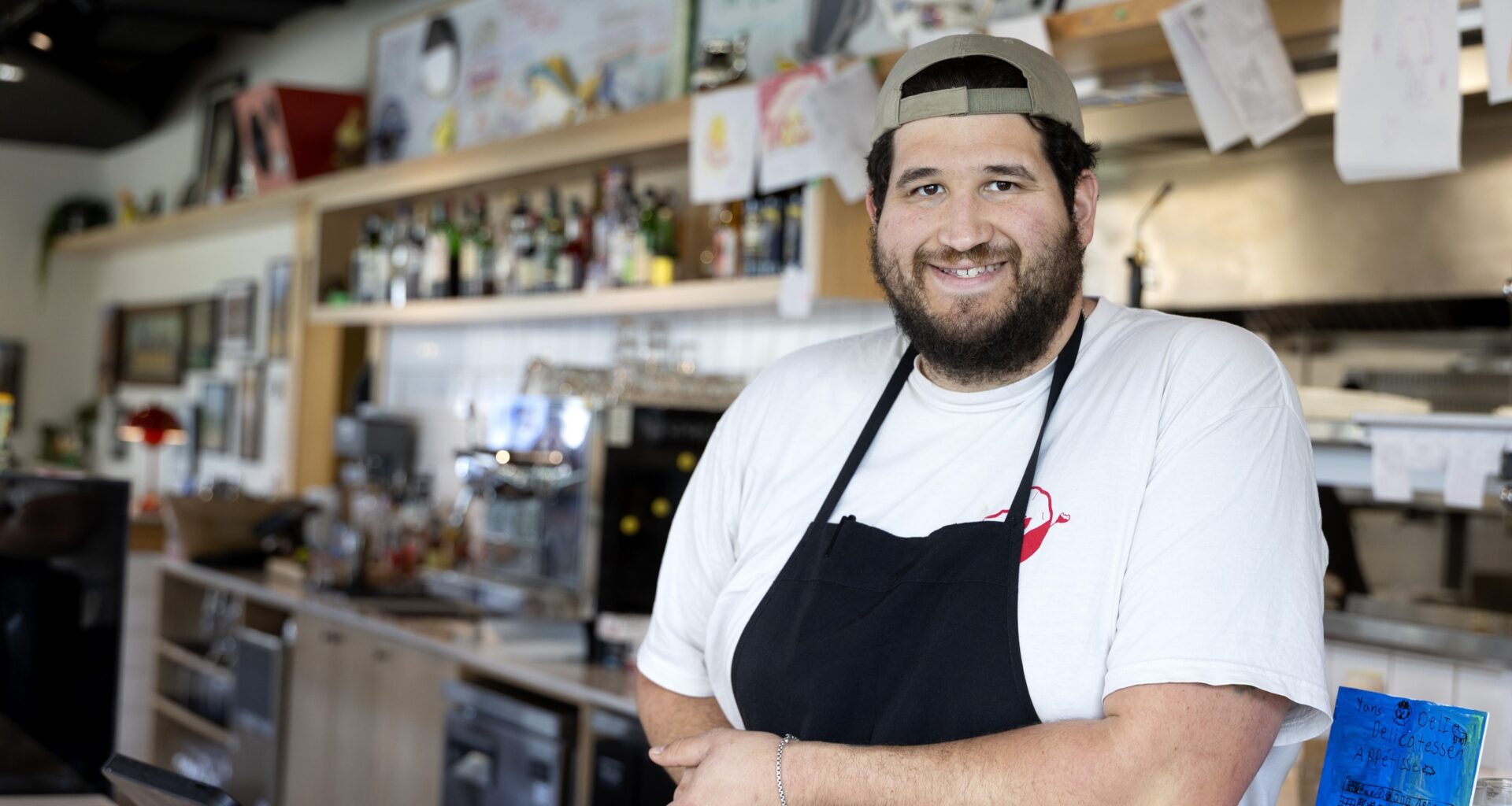 Guy at restaurant counter.