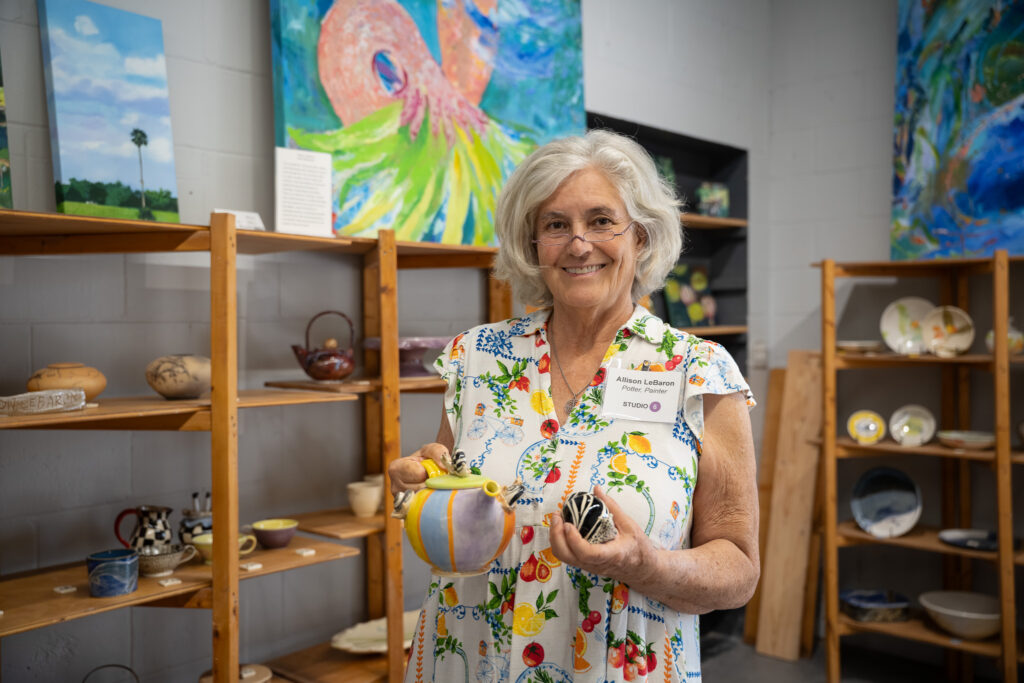 Allison LeBaron (Potter, Painter) Showing some of her favorite pieces in her studio.