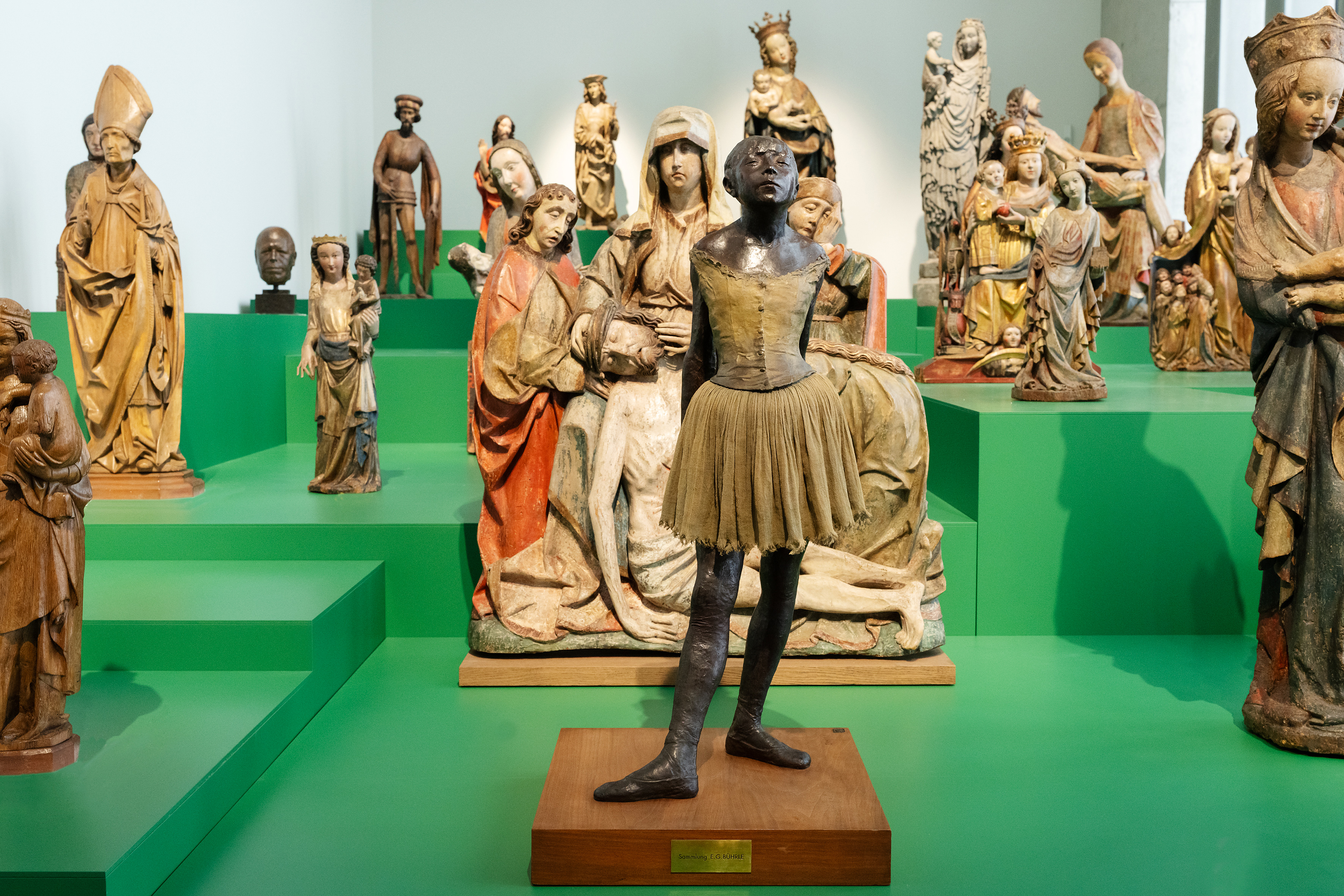 Sculptures and statues displayed in a random procession at the third iteration of the Bührle Collection at Zurich's Kunsthaus.