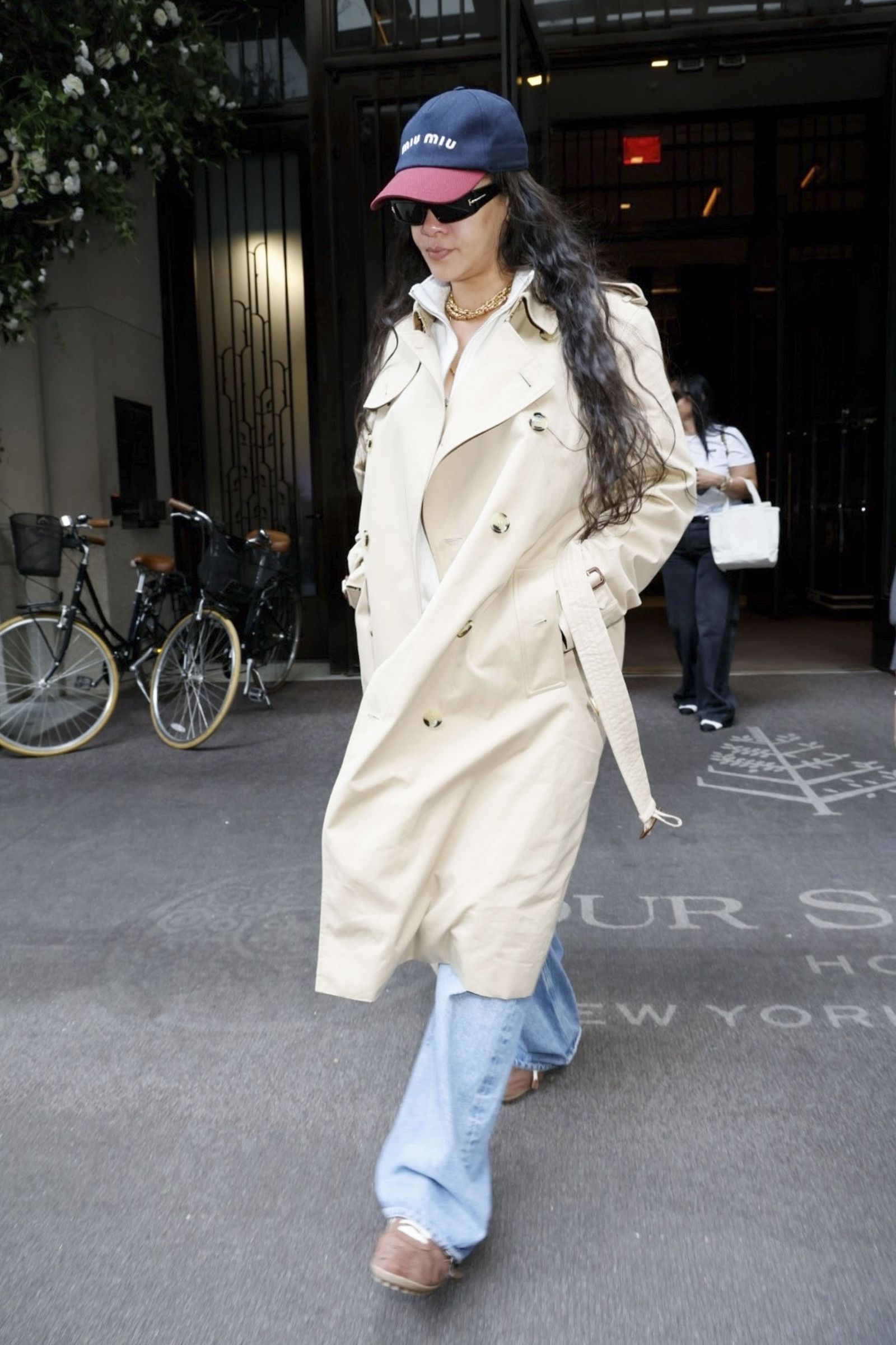 EXCLUSIVE Manhattan NY Rihanna was seen leaving the Four Seasons Hotel in Manhattan New York City wearing a blue Miu Miu...