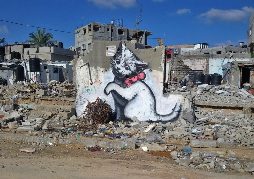 Banksy’s Gaza Kitty: Meaning, Mural and Walled Off Hotel Sculpture