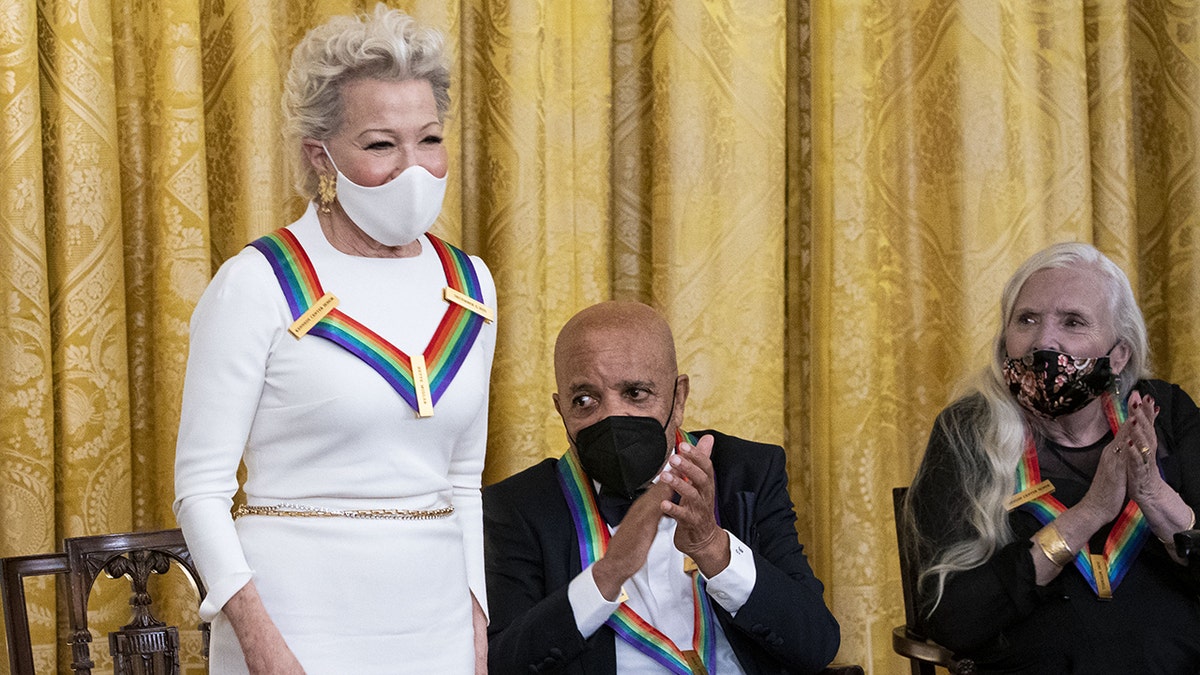 Actress Bette Midler standing during the Kennedy Center Honorees Reception in the East Room of the White House