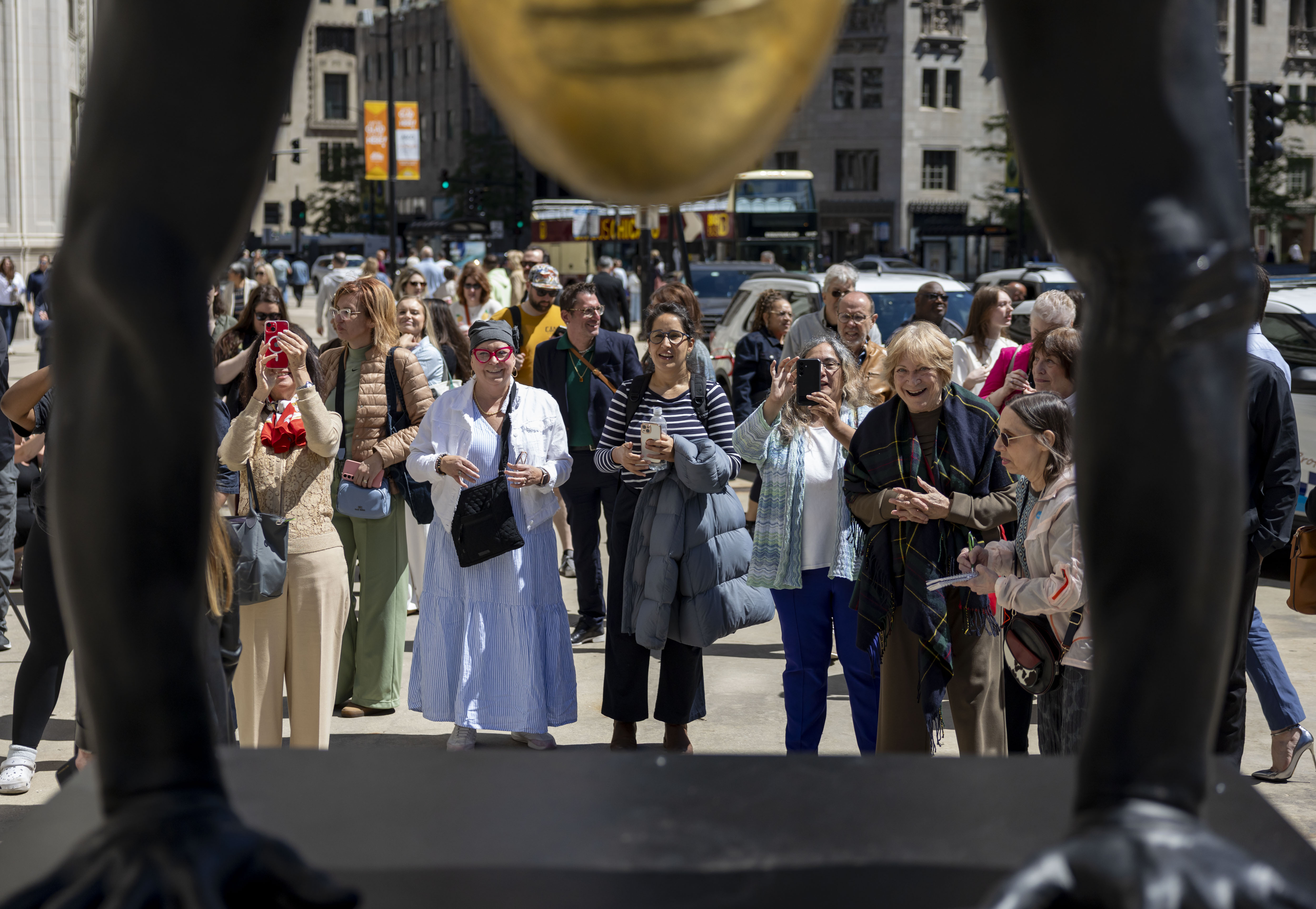 People look at The Golden Mean, one of a series...