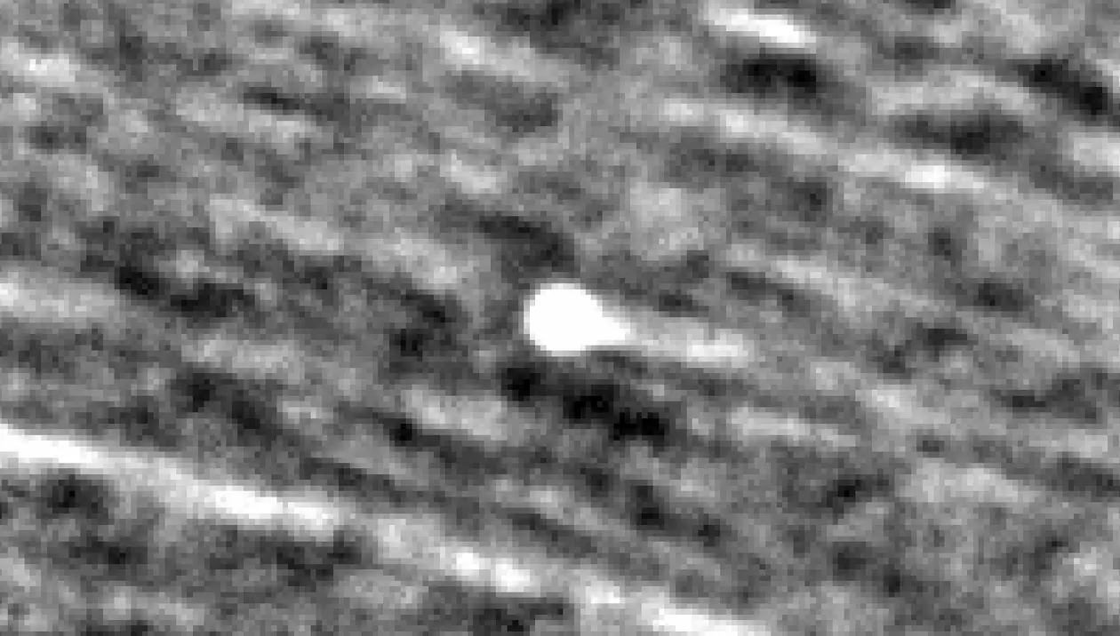 Comet 3I-ATLAS appears as a bright object near the center of this image, made from combining observations from NASA’s PUNCH mission taken from Sept. 20 to Oct. 3, 2025