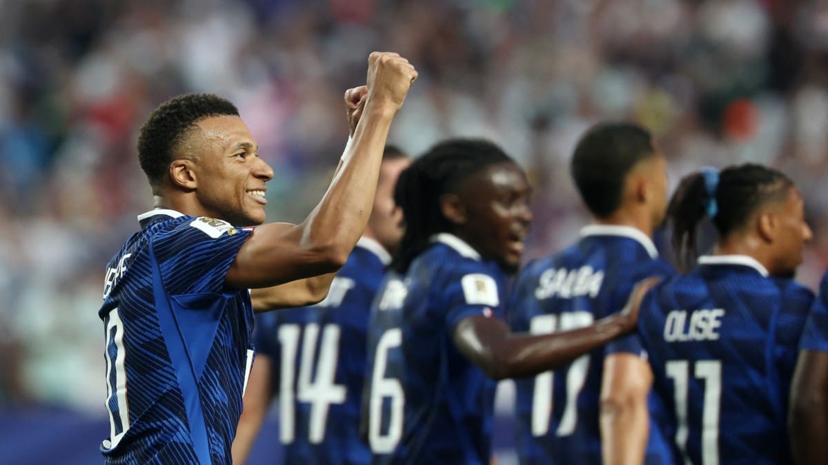 Fifa World Cup: Kylian Mbappe hits double as France reach knockout stage after rain-delayed Iraq match