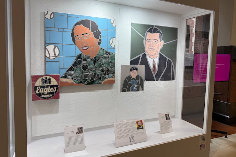 Mosaic of Effa Louise Manley and drawing of Bert Bell at City Hall on Thursday.