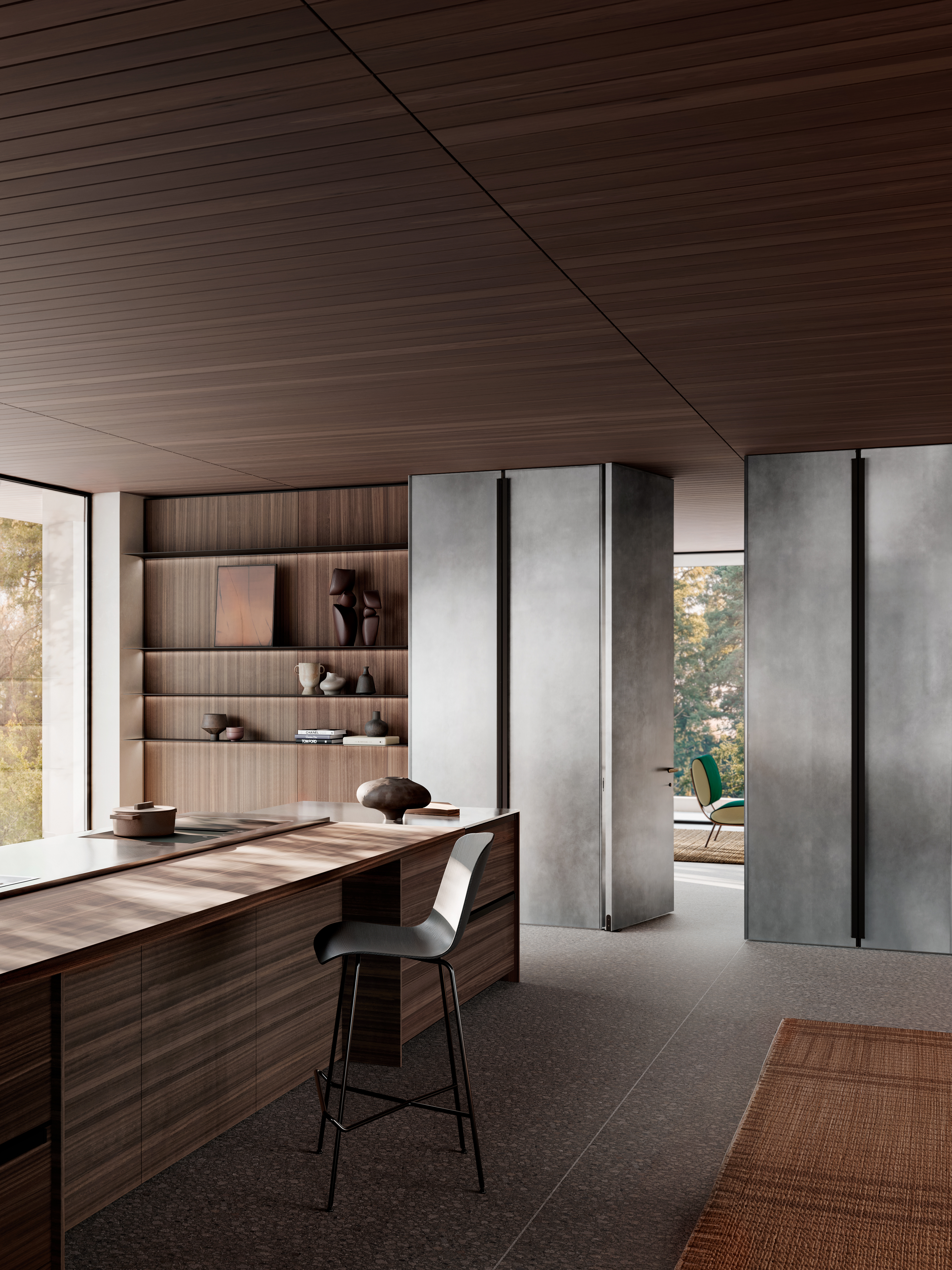 a wooden clad room with metal doors into the next space