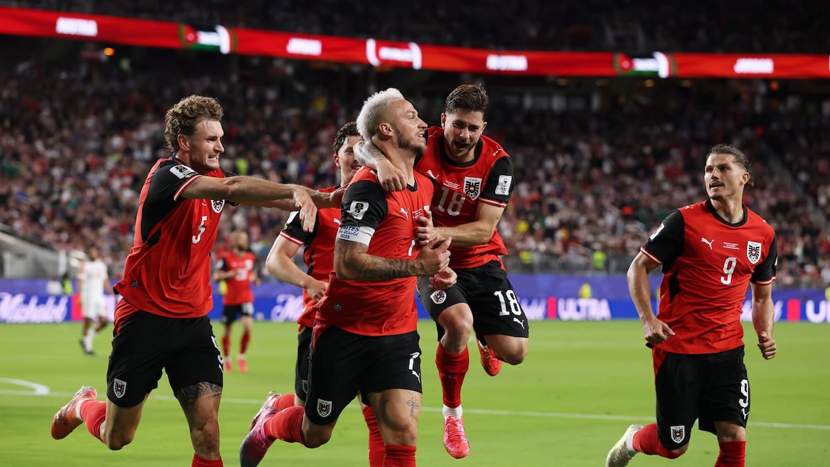Fifa World Cup: Austria and Algeria both progress after thrilling draw