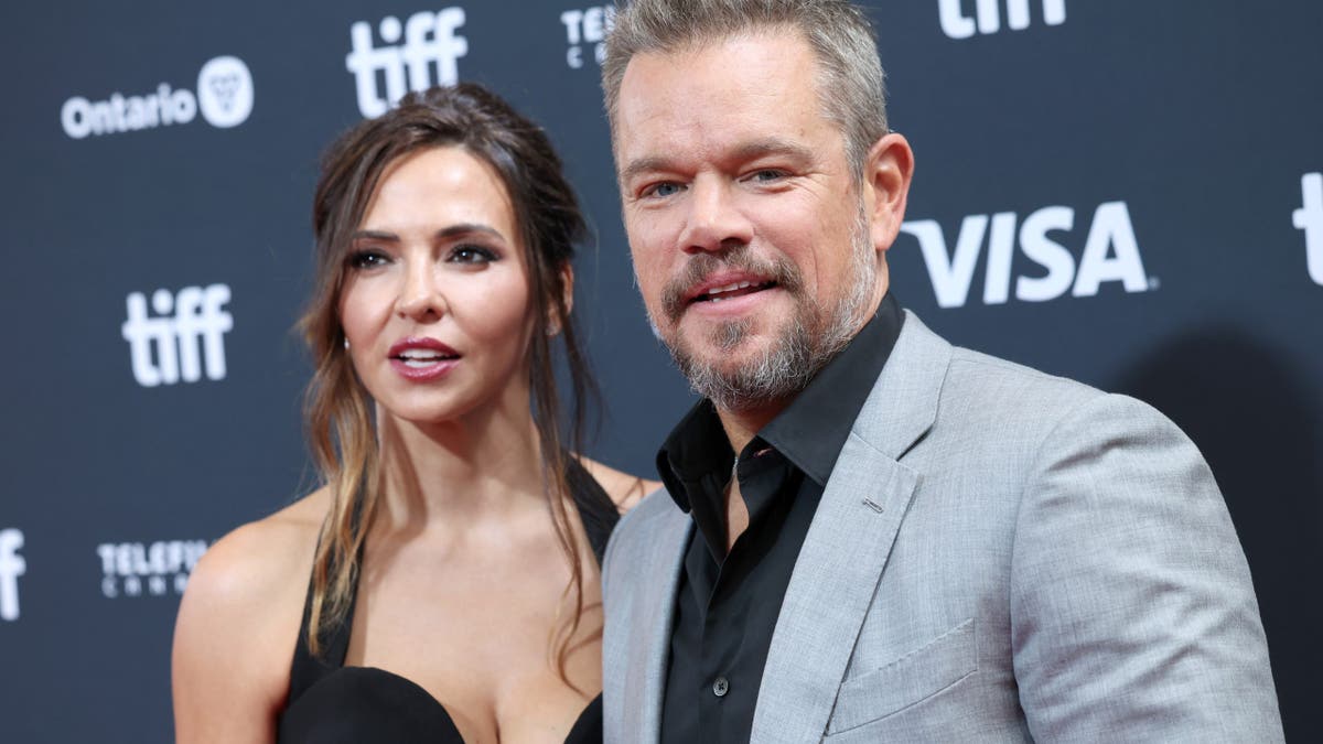 Matt Damon and Luciana Damon standing together at the Toronto International Film Festival premiere.