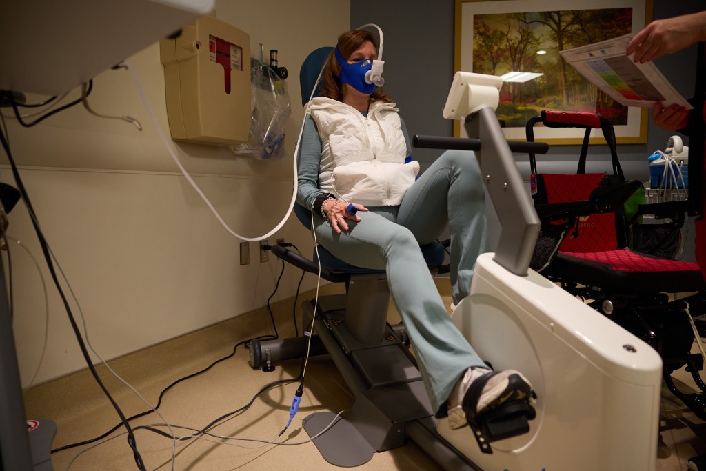 During a CPET, researchers collect data about a patient's lungs and heart, providing insights on the body's response to exercise and stress. (Photo by Kate Dearman for The Washington Post via Getty Images)
