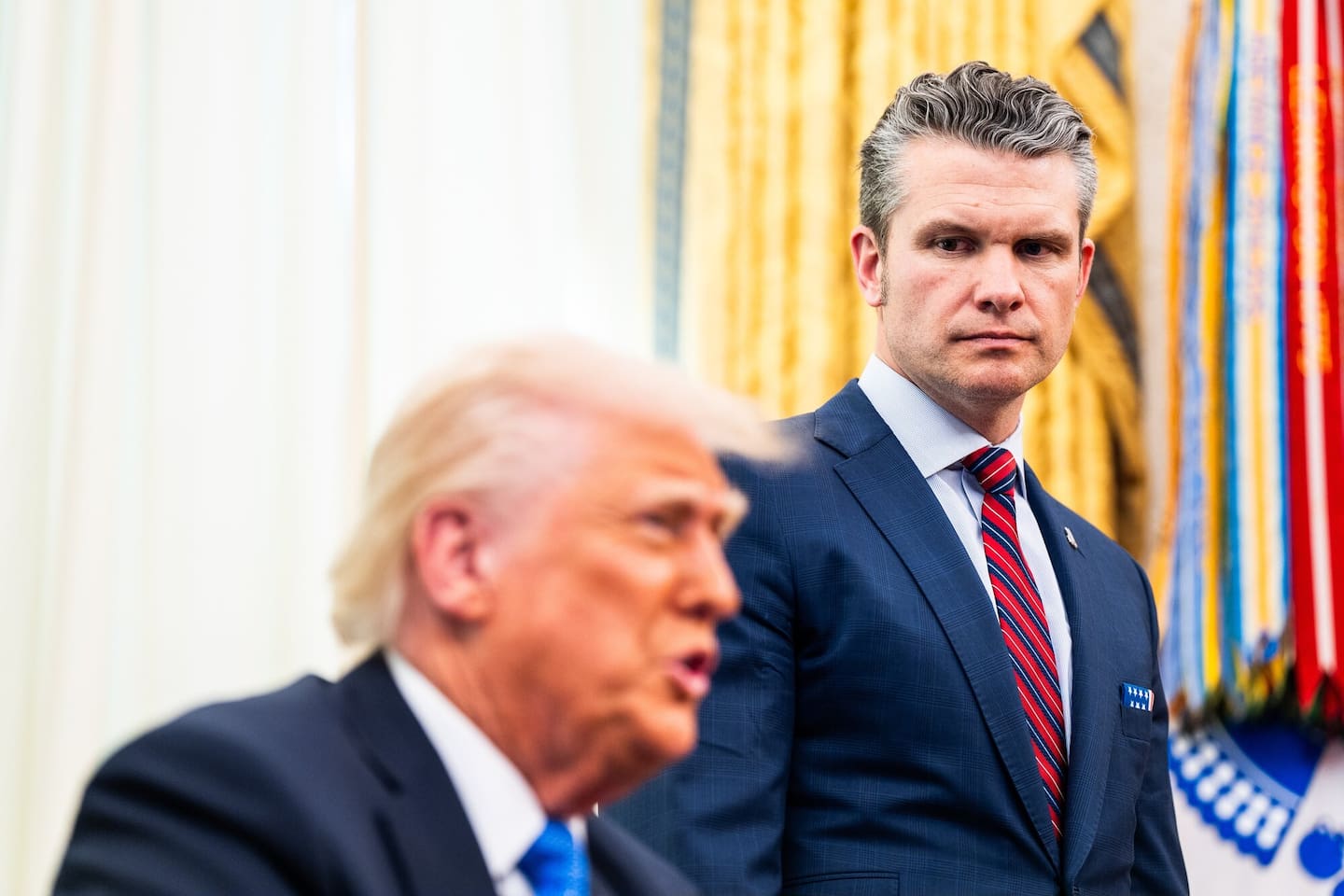 Defence Secretary Pete Hegseth with President Donald Trump in the Oval Office. Photo / Demetrius Freeman, The Washington Post