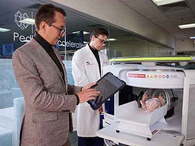 Drs. Marius Linguraru and Daniel Donoho demonstrate the Hyperfine Swoop using babydoll Lilly to walk through the process.