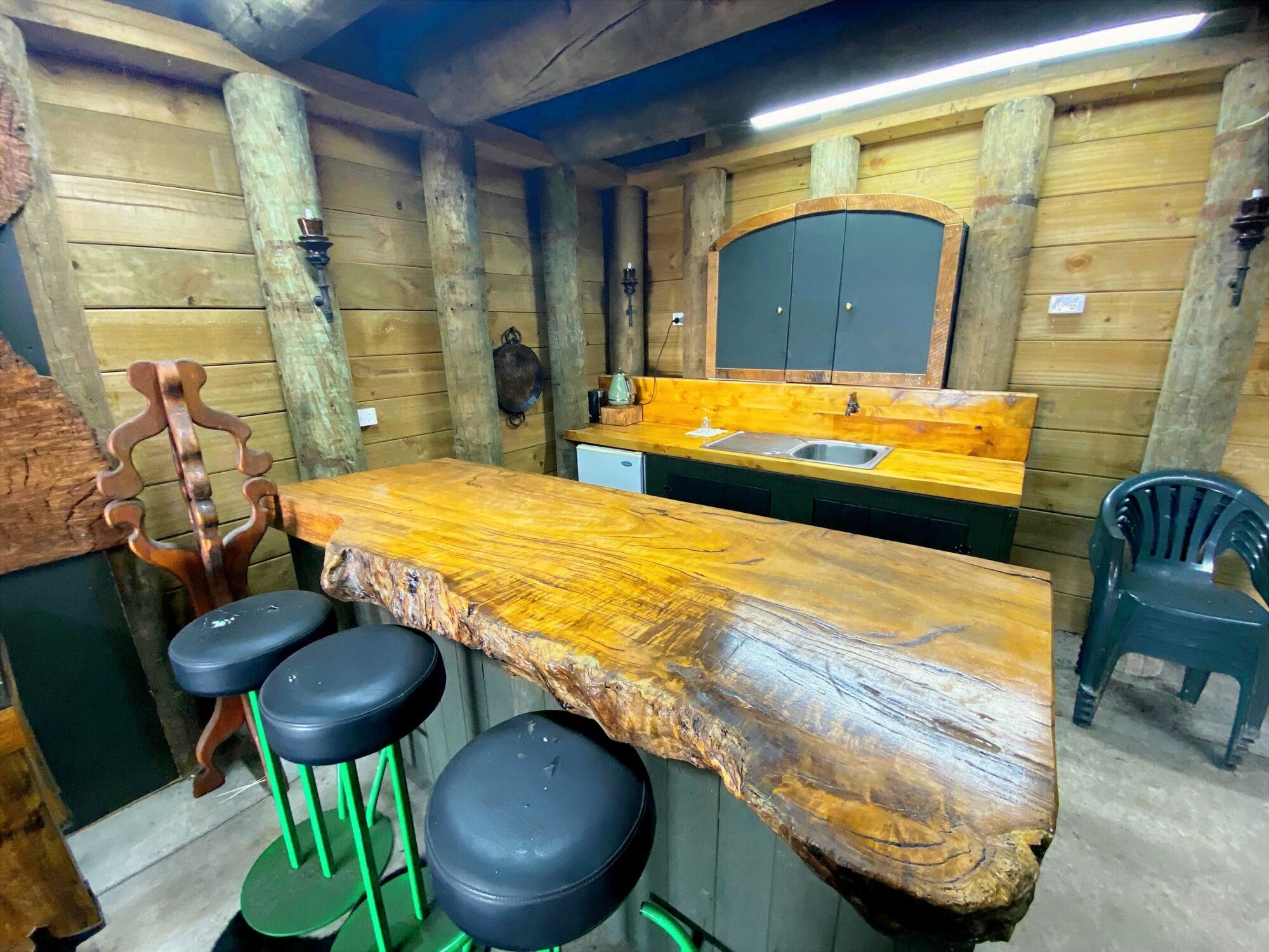The kitchen area features cabinetry and a benchtop he built himself.  Photo / Rosalie Liddle Crawford