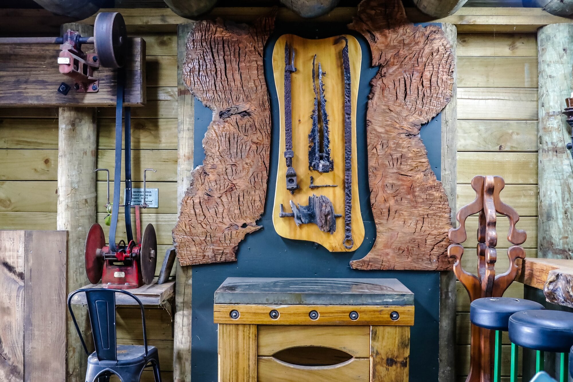 Carmichael has turned pieces of wood, rustic steel and salvaged farm machinery into artworks and sculptures. Photo / Kelly O’Hara