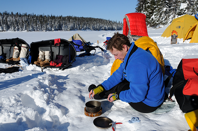 winter camper cooking outside