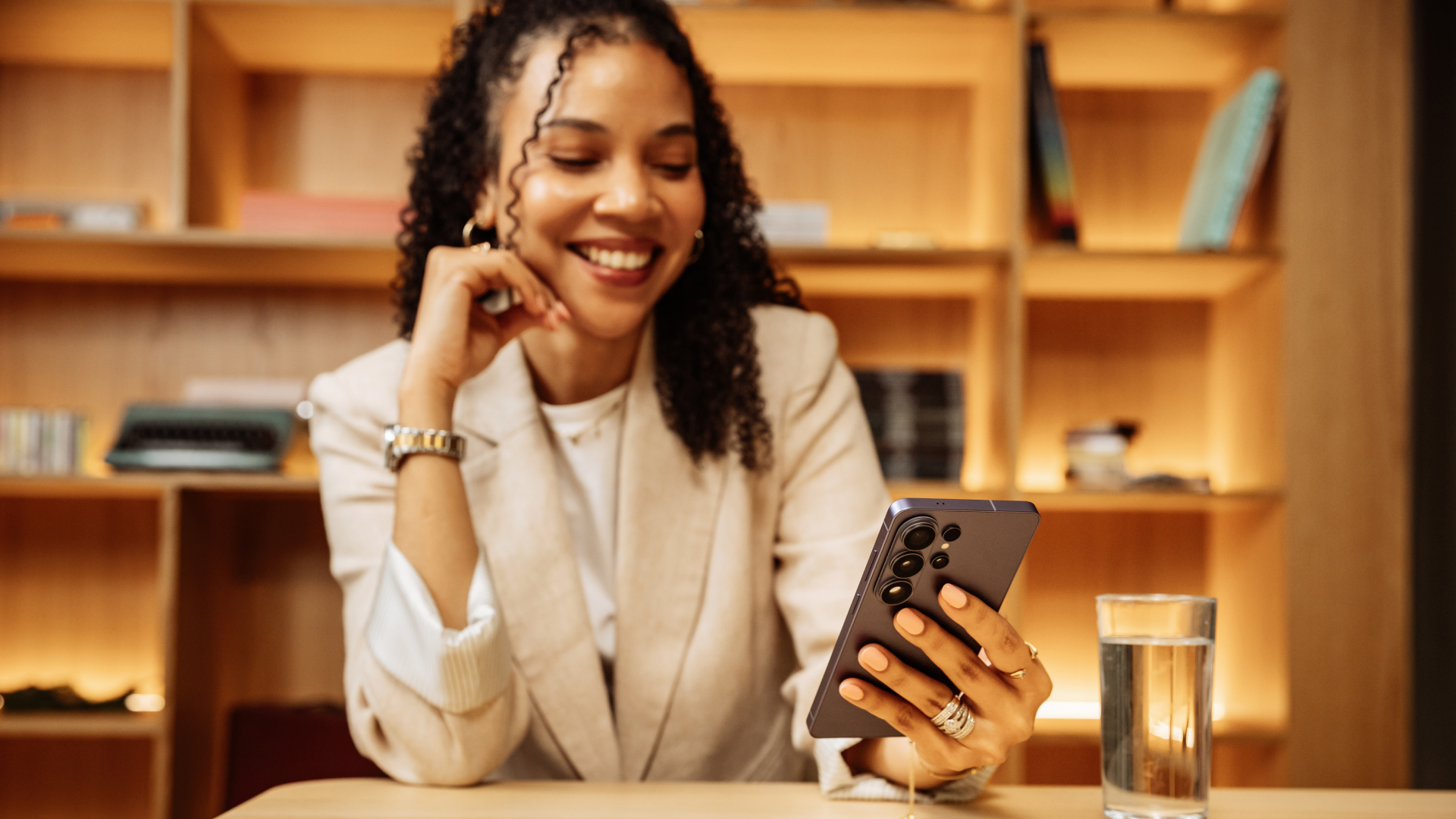 A woman takes a video call on a Samsung Galaxy S26 Ultra