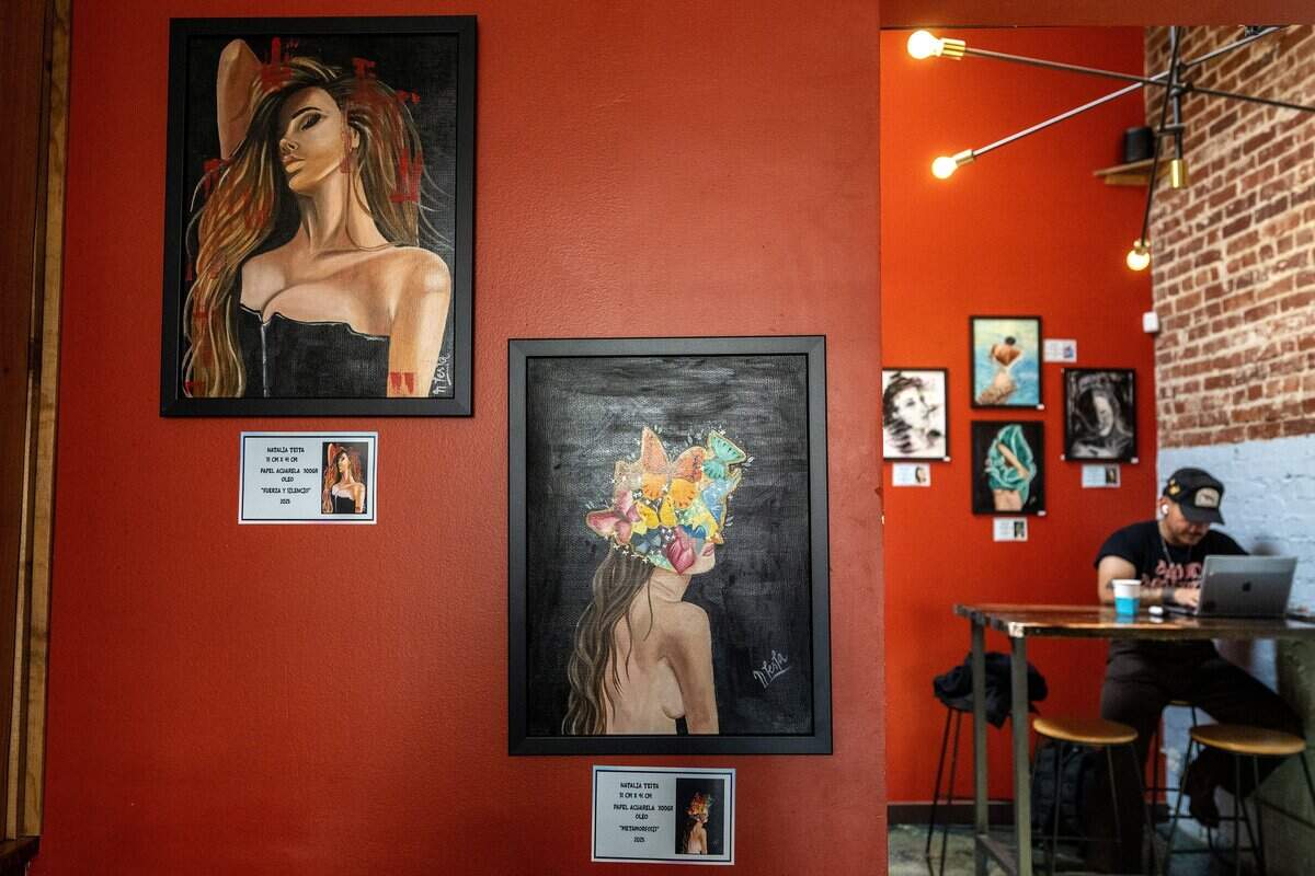 Artwork by Natalia Testa, an artist from Buenos Aires, Argentina, is displayed in a gallery at the Crossroads location of Café Corazón on Wednesday, June 24, 2026, in Kansas City.