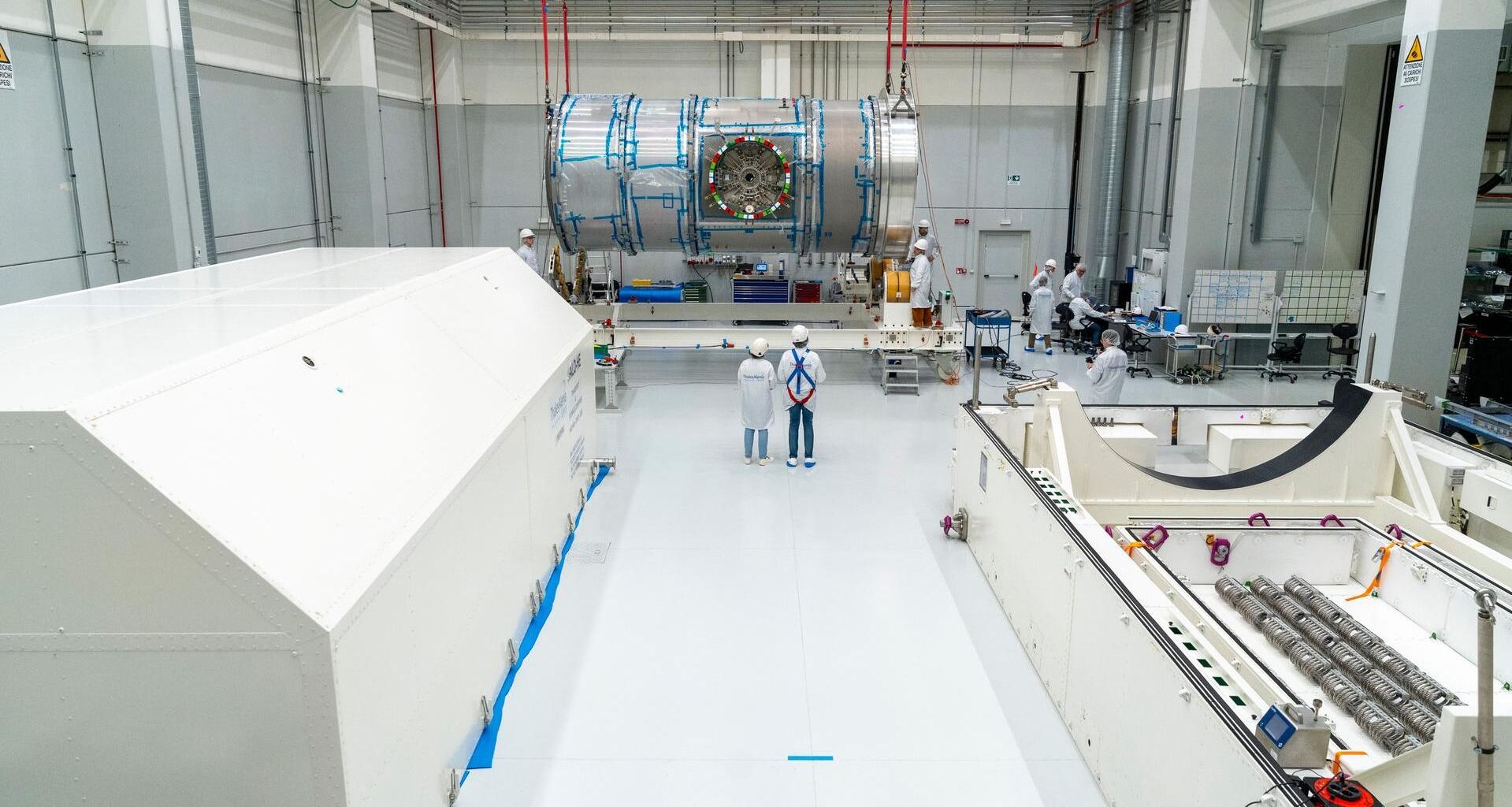 Technicians at Thales Alenia Space in Turin, Italy prepare the HALO habitat module for transport to the United States.