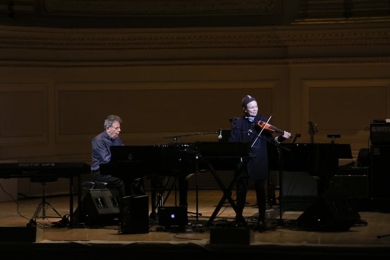 Laurie Anderson performs with Philip Glass at Carnegie Hall in New York in 2017. Photograph: Rebecca Smeyne/The New York Times