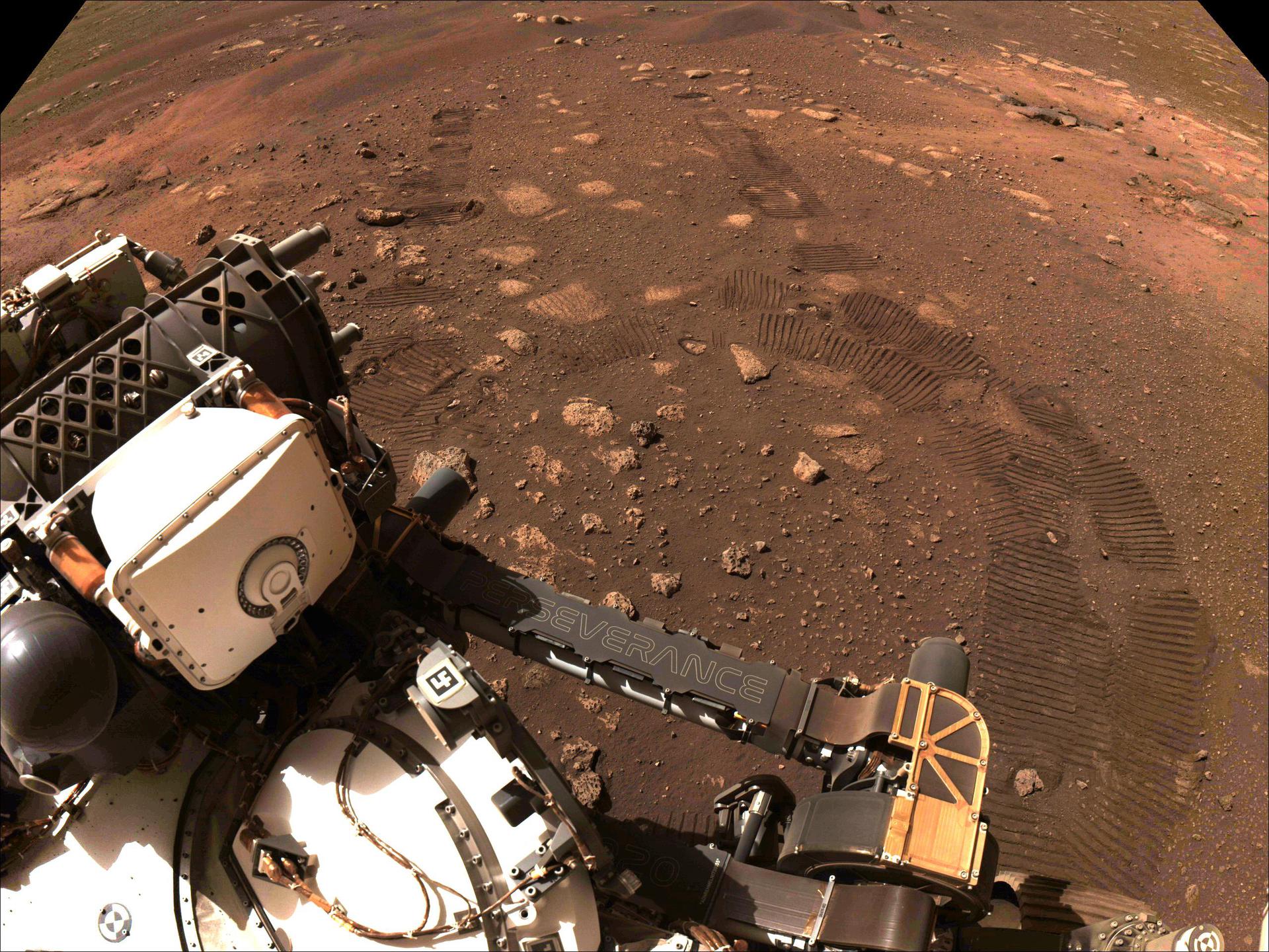 This image was taken during the first drive of NASA's Perseverance rover on Mars on March 4, 2021. Perseverance landed on Feb. 18, 2021, and the team has been spending the weeks since landing checking out the rover to prepare for surface operations. This image was taken by the rover's Navigation Cameras. A key objective for Perseverance's mission on Mars is astrobiology, including the search for signs of ancient microbial life. The rover will characterize the planet's geology and past climate, pave the way for human exploration of the Red Planet, and be the first mission to collect and cache Martian rock and regolith (broken rock and dust). Subsequent NASA missions, in cooperation with ESA (European Space Agency), would send spacecraft to Mars to collect these sealed samples from the surface and return them to Earth for in-depth analysis. The Mars 2020 Perseverance mission is part of NASA's Moon to Mars exploration approach, which includes Artemis missions to the Moon that will help prepare for human exploration of the Red Planet. https://photojournal.jpl.nasa.gov/catalog/PIA24487