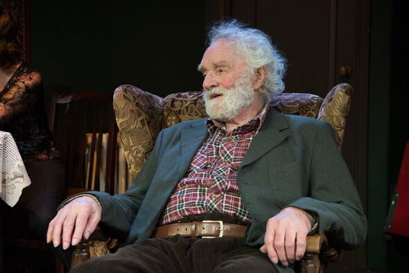 Close up of Patrick Godfrey sitting in a chair Close up of Patrick Godfrey sitting in a chair