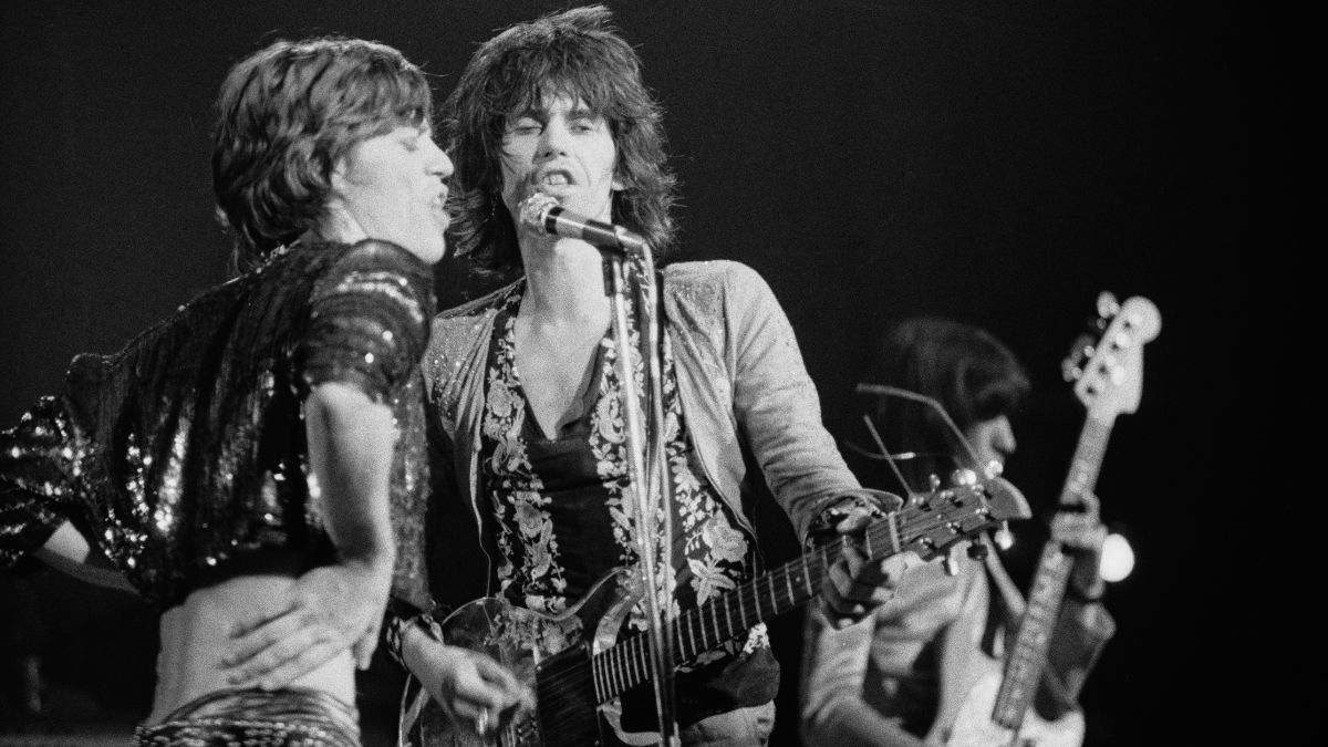 Mick Jagger and Keith Richards perform live on stage at The Roundhouse in London on 14th March 1971. Keith Richards is playing his Ampeg Dan Armstrong guitar.