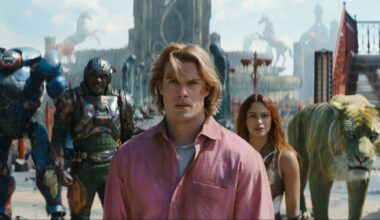 (l-r): Roboto (Kristen Wiig), Man At Arms (Idris Elba), Adam (Nicholas Galitzine), Teela (Camila Mendes) and Cringer in MASTERS OF THE UNIVERSE.