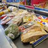 Grocery food shopping on conveyor belt at supermarket checkout till in Lidl, UK. (Photo by: Alex Segre/UCG/Universal Images Group via Getty Images)