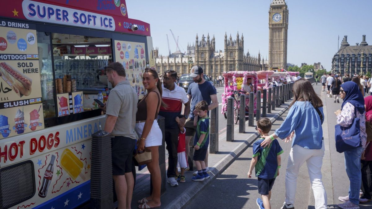 As record-breaking spring temperatures continue in the capital, visitors buy ice creams on Westminster Bridge, on 26th May 2026, in London, England. The record for the hottest day for May temperature in the UK has been broken for the second day in a row, with 35C recorded. (Photo by Richard Baker / In Pictures via Getty Images)