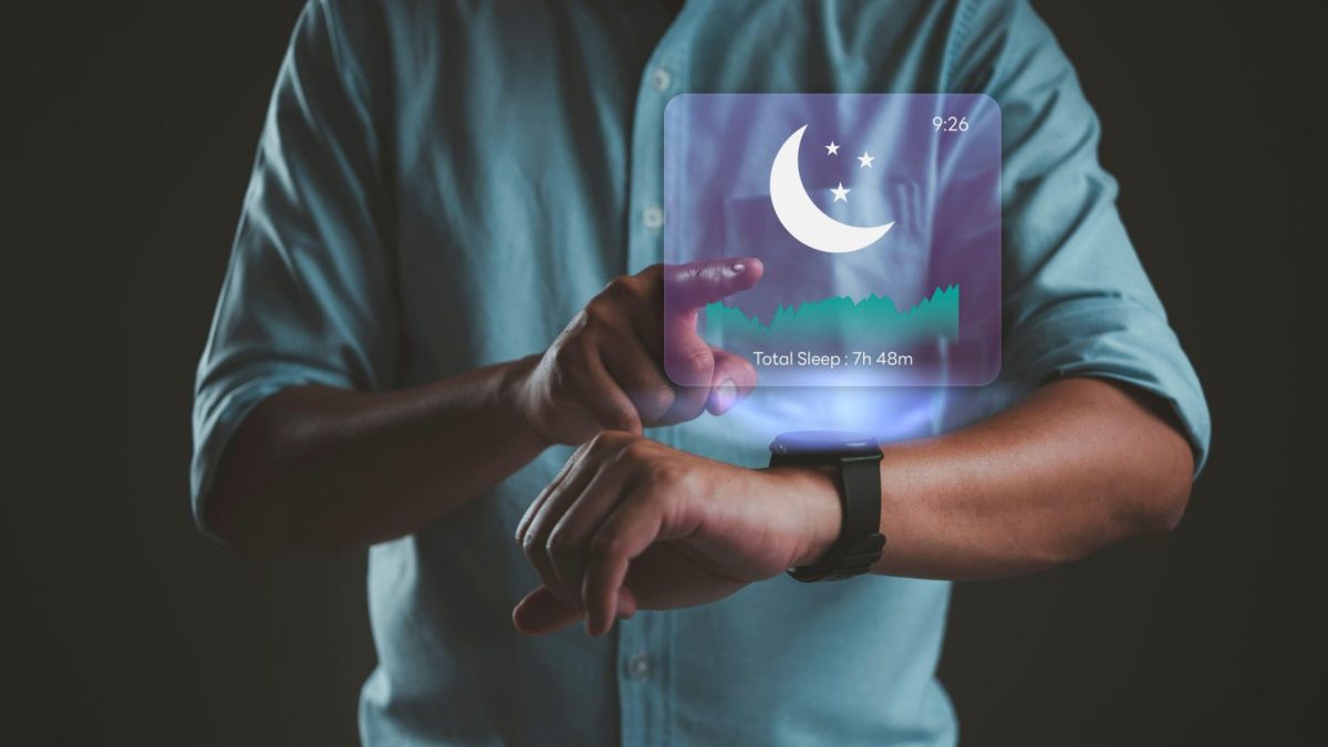 This is a generic photo of a man looking as his total sleep data on a smartwatch. See PA Feature WELLBEING Sleep. WARNING: This picture must only be used to accompany PA feature WELLBEING Sleep PA Photo. Picture credit should read: Alamy/PA. NOTE TO EDITORS: This picture must only be used to accompany PA Feature WELLBEING Sleep.