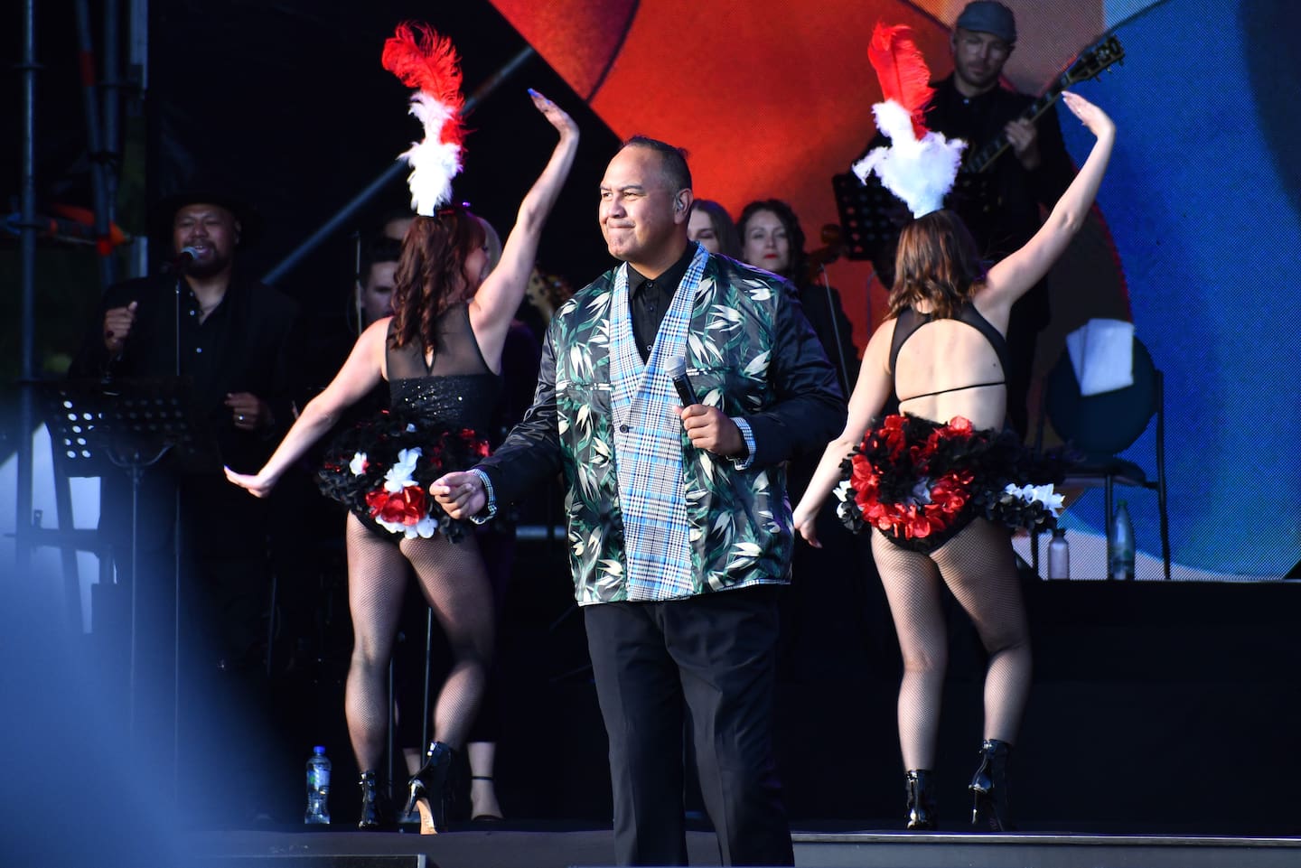 Russell Harrison on stage at Re-Imagine Lakeside 2024. Photo / Laura Smith