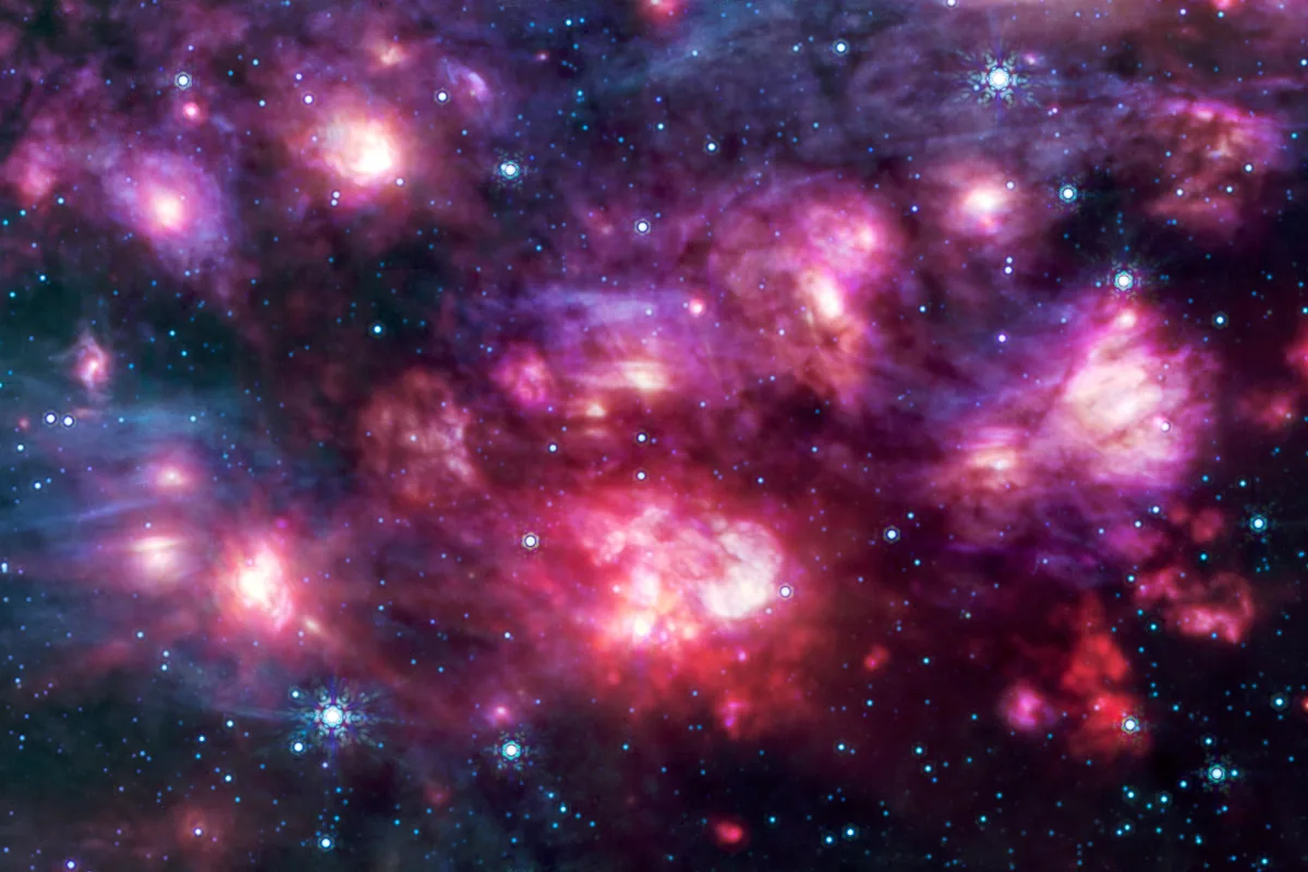 Section of an image showing the star-forming region Sagittarius B2 in mid-infrared light, captured by the James Webb Space Telescope's MIRI instrument. Credit: NASA, ESA, CSA, STScI, Adam Ginsburg (University of Florida), Nazar Budaiev (University of Florida), Taehwa Yoo (University of Florida); Image Processing: Alyssa Pagan (STScI)